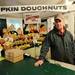 Jenny's Farm Market owner Burton Hoey poses for a photo at the cashiers table inside the market, located at the corner of Island Lake Road and Dexter-Pinckney Road just outside Dexter on Wednesday. Melanie Maxwell I AnnArbor.com